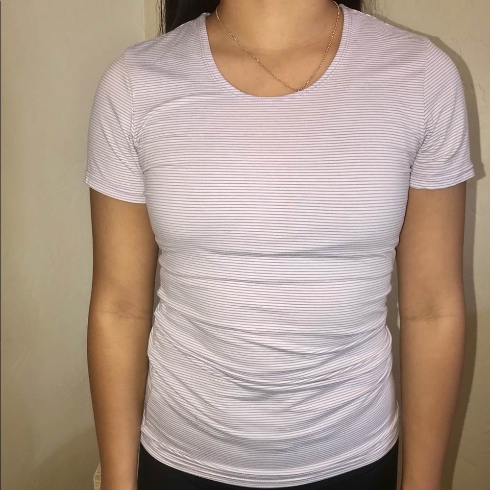 purple and white thin striped athletic shirt
